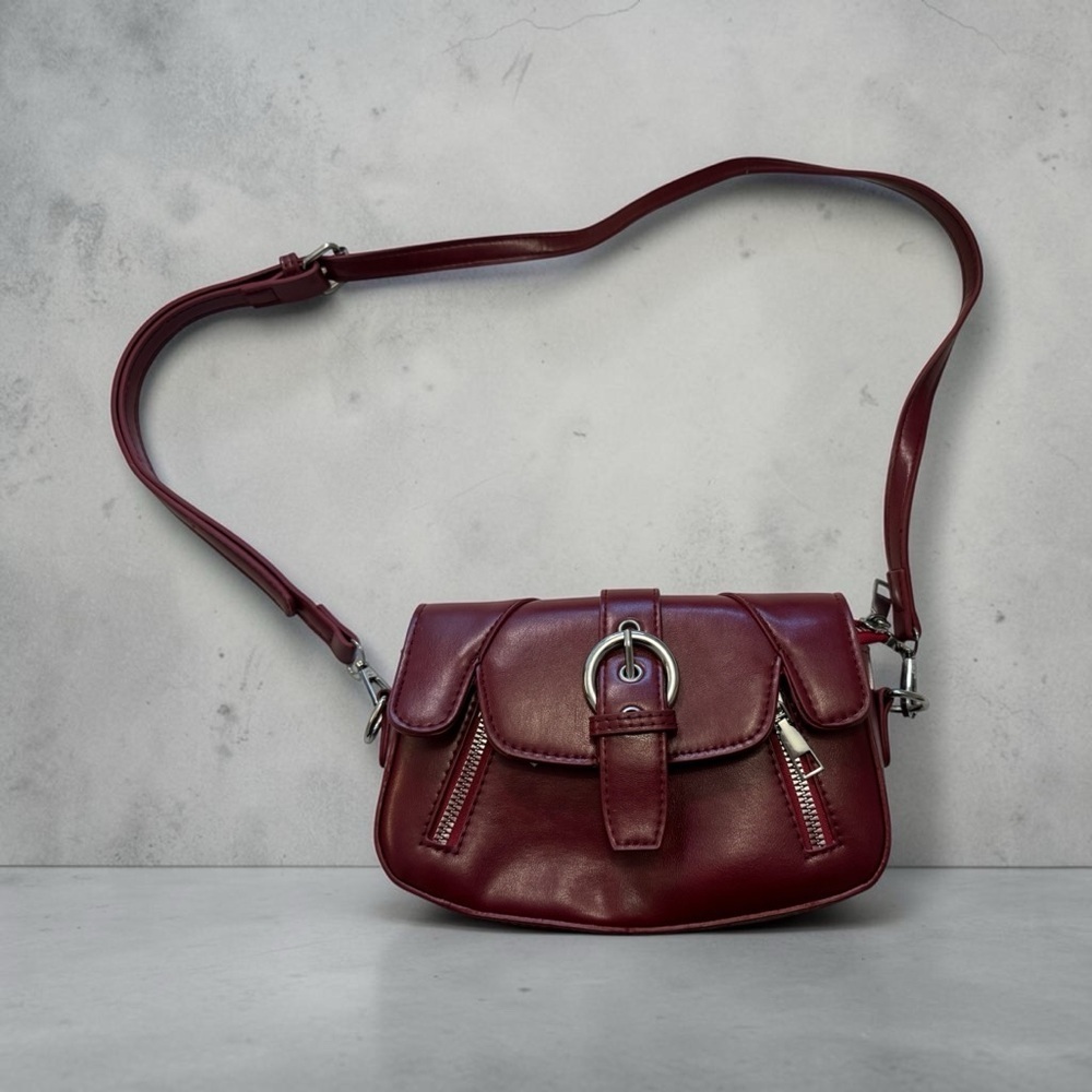 Sleek Wine Leather Crossbody Bag with Buckle Accent